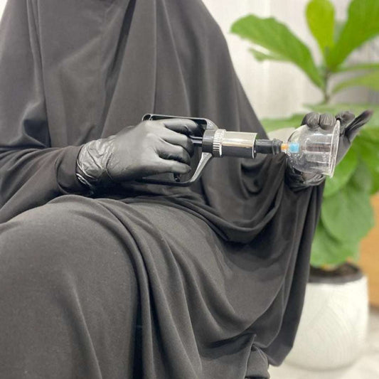 Manual Hijama Cupping Pump black heavy-duty handheld suction pump with transparent cup attachment used for cupping therapy